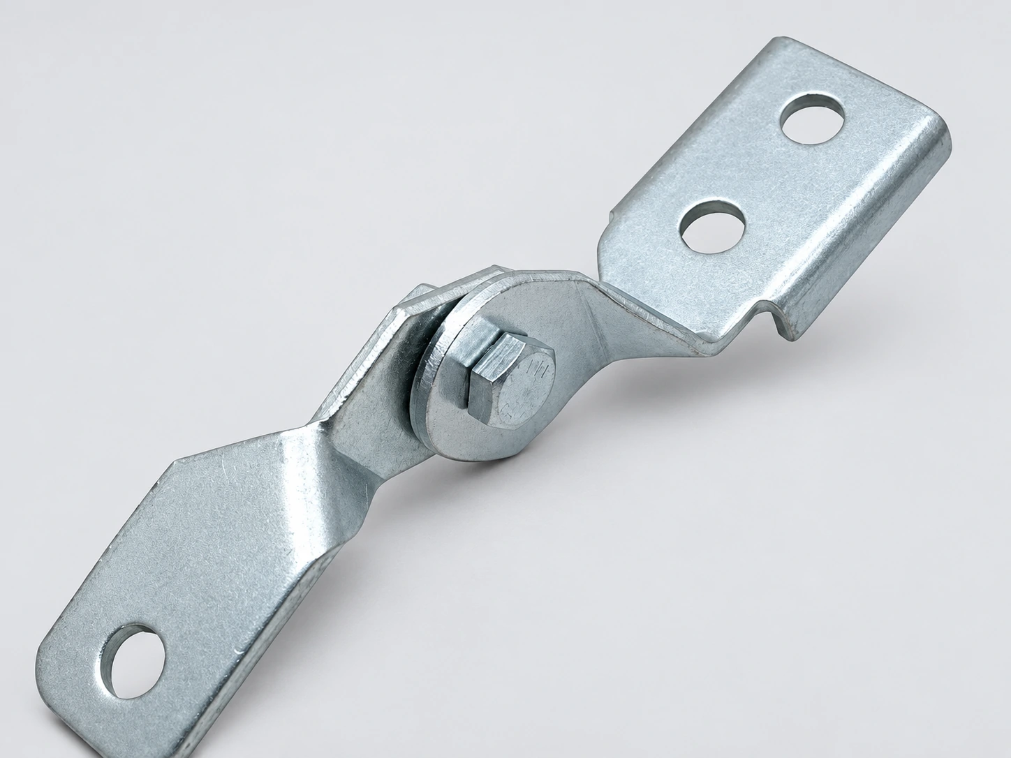 Two galvanised steel plates joined by a pivot bolt forming an articulated support bracket