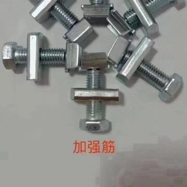 Galvanised channel nut and hex bolt assemblies arranged on a white surface